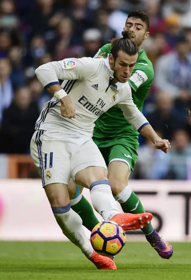 Gareth Bale of Real Madrid with Leganes' defender Diego Rico