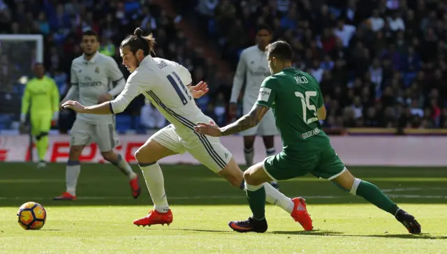 Gareth Bale with Leganes' Diego Rico