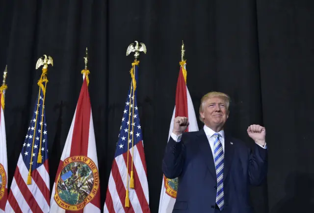 Republican presidential nominee Donald Trump arrives for a rally in the Robarts Arena of the Sarasota Fairgrounds in Sarasota, Florida.