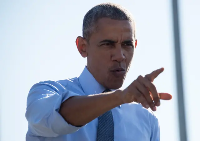 President Barack Obama speaks at a rally for Democratic presidential nominee Hillary Clinton in Ann Arbor, Michigan.