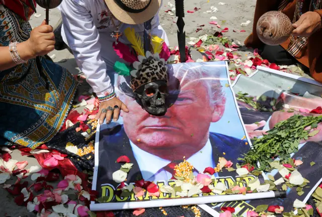 Peruvian shamans with poster of U.S. Republican presidential candidate Donald Trump perform a ritual of predictions ahead of the US election.