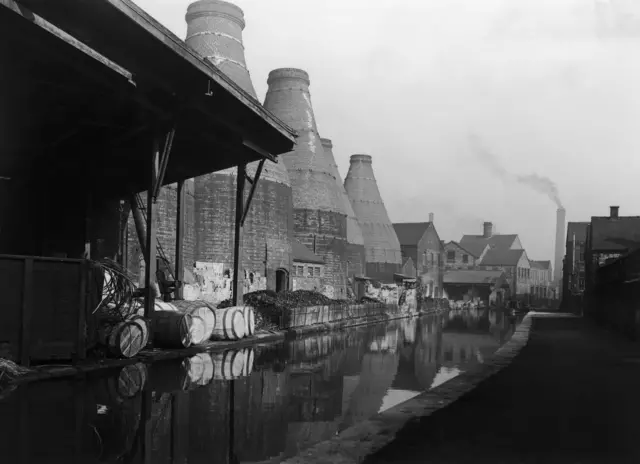 Image of bottle kilns beside canal