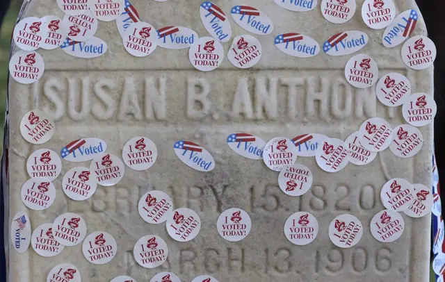 Stickers on Anthony's tombstone in Rochester, New York, 8 November