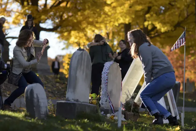 People in Mount Hope Cemetery in Rochester, New York, 8 November