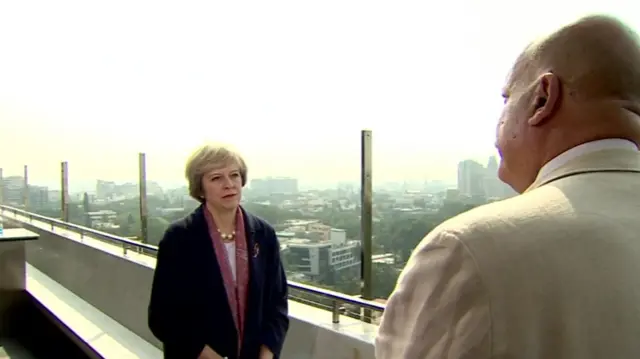 Theresa May and John Pienaar