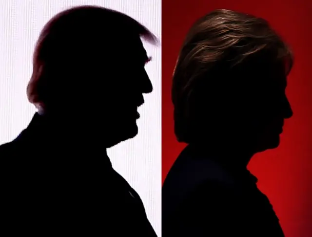 Silhouettes of the 2016 US presidential election candidates Donald Trump and Hillary Clinton