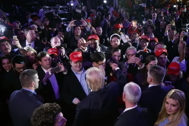 President-elect Donald Trump waves to the crowd during an election night rally