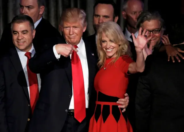 Donald Trump and his campaign manager Kellyanne Conway greet supporters during his election night rally in Manhattan, New York, U.S., November 9, 2016.