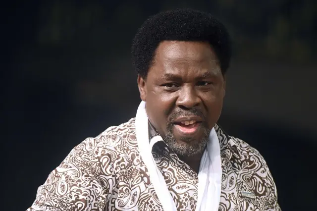 Nigerian pastor TB Joshua speaks during a New Year's memorial service for the South African relatives of those killed in a building collapse at his Lagos megachurch on December 31, 2014.