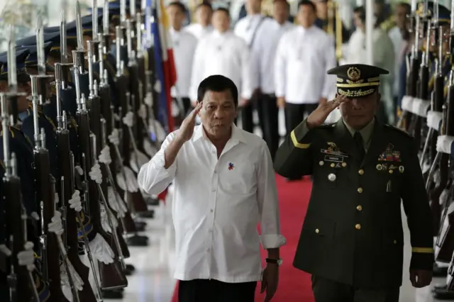 Philippine President Rodrigo Duterte, left