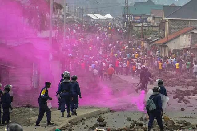 Flares are launched by DR Congo Police forces during a demonstration in Goma on September 19, 2016.