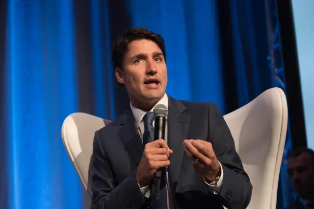 This file photo taken on October 13, 2016 shows Canadian Prime Minister Justin Trudeau speaking to business leaders on the free trade agreement between Canada and Europe in Montreal, Quebec