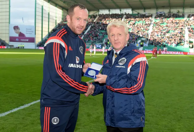 Stoke City midfielder Charlie Adam (left) and Scotland manager Gordon Strachan