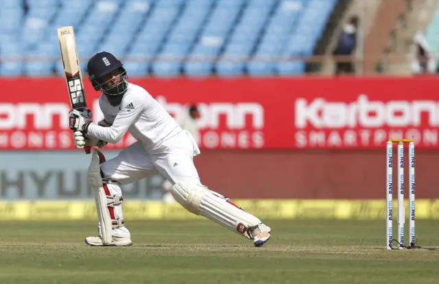 Moeen Ali watches the ball