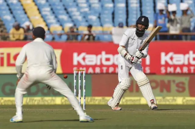 Moeen Ali watches the ball