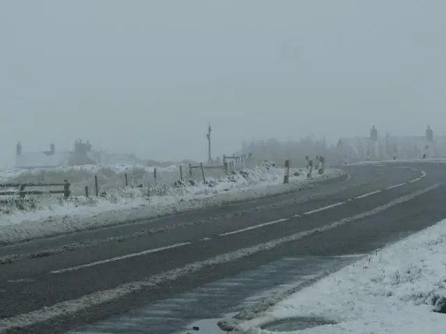 Snowy road in Leek