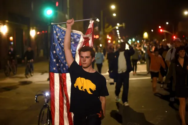 Protesters against president-elect Donald Trump march through Oakland, California/