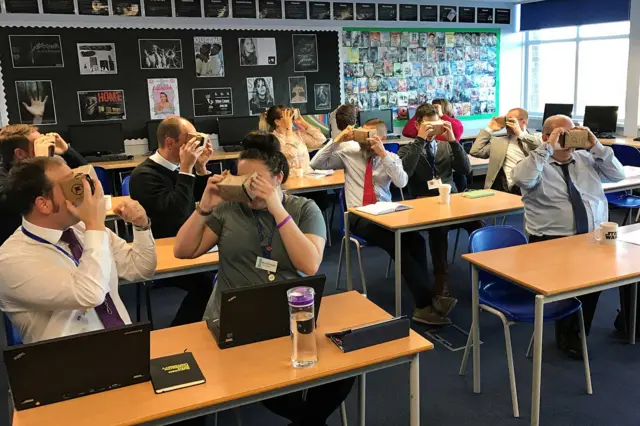 Stoke Damerel Community College staff test out the Google Cardboard viewers during their training session