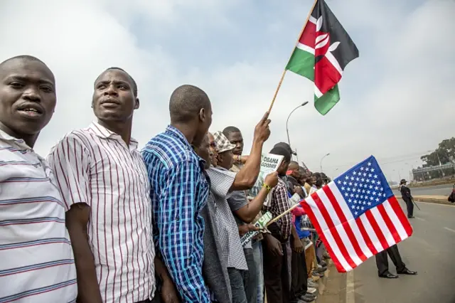 enyans outside the Kasarani Safaricom Sports Stadium off Thika Superhighway wait for the arrival of US President on day 2 of his official 4 day East Africa state visit on July 26, 2015