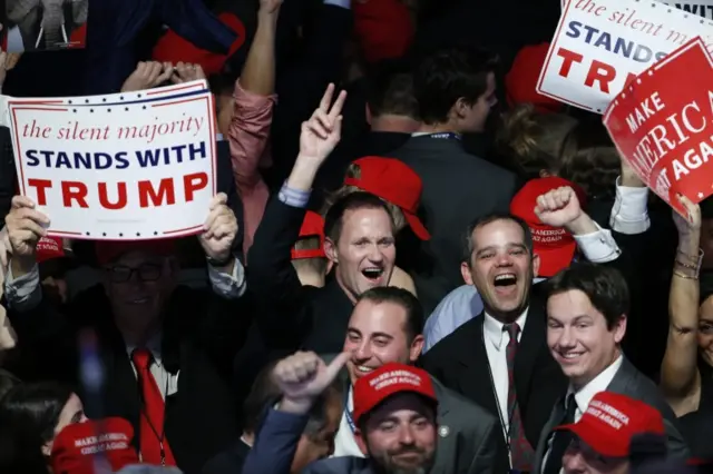 Supporters cheer for US President-elect Donald Trump at his 2016 US presidential Election Night