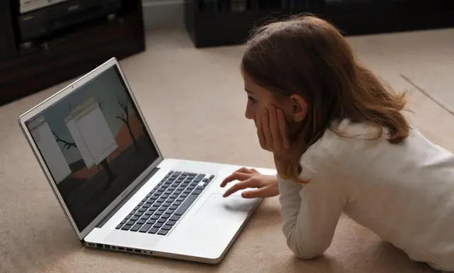 Young girl browsing the internet