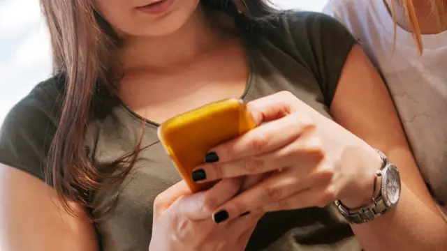 Girl using mobile phone