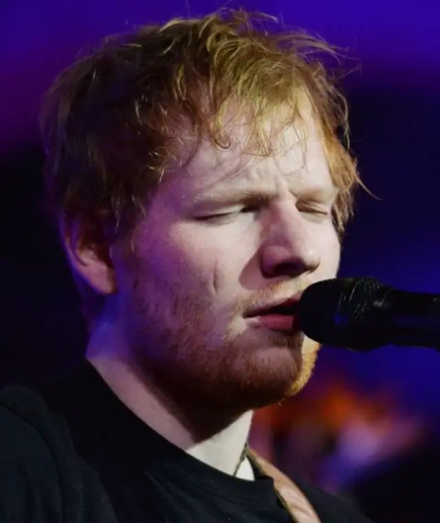 The scar, visible on Ed Sheeran's face