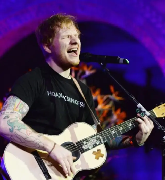 Ed Sheeran, with guitar