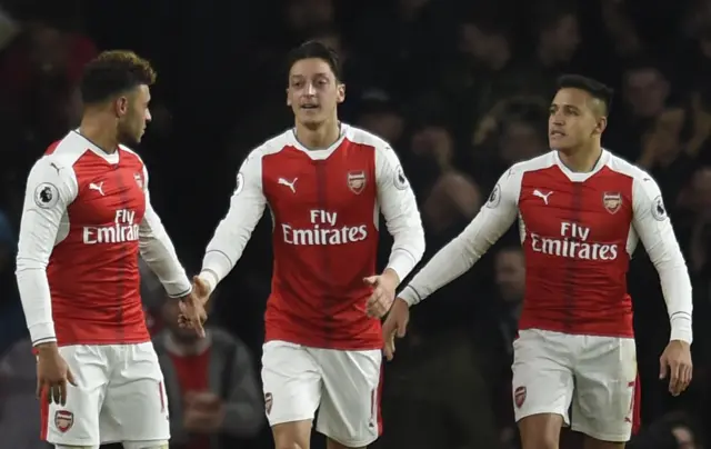 Mesut Ozil celebrates