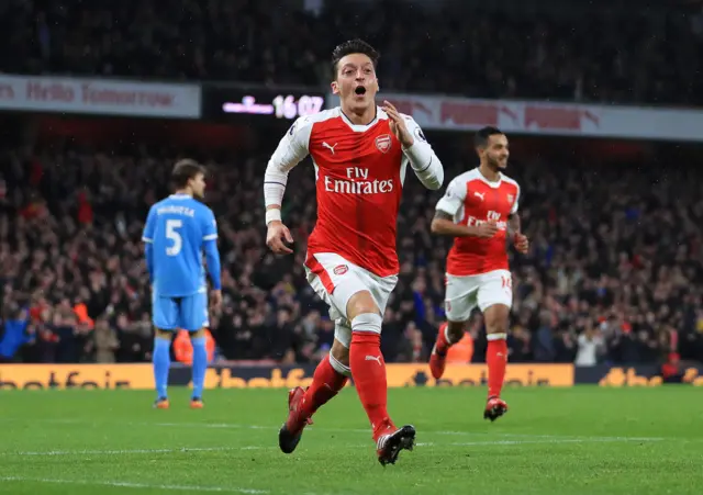 Mesut Ozil celebrates