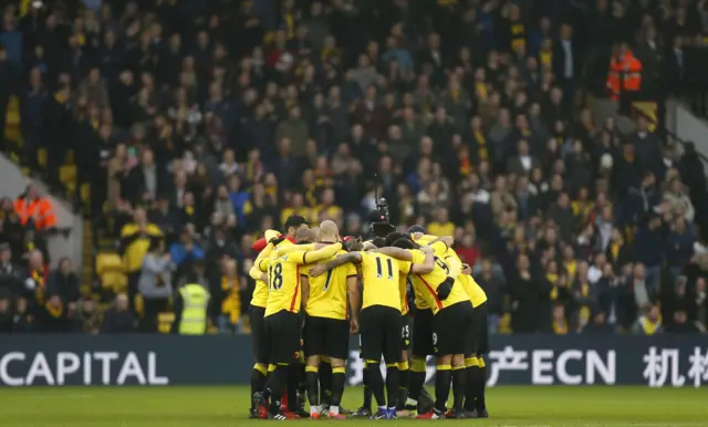 Watford players huddle