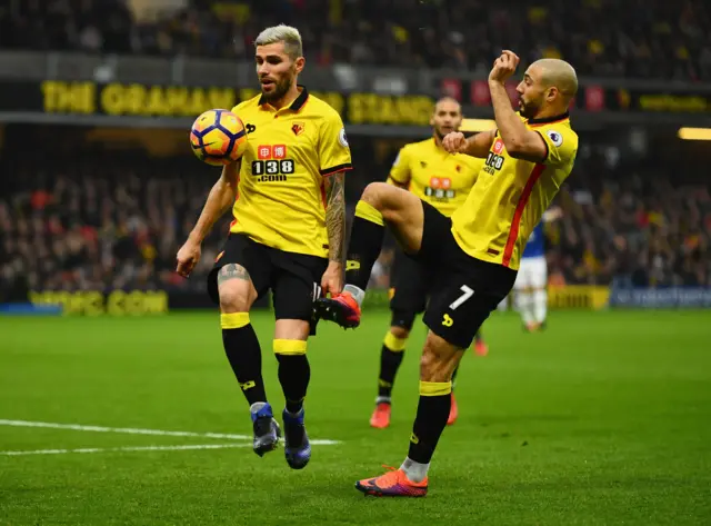 Valon Behrami and Nordin Amrabat in action