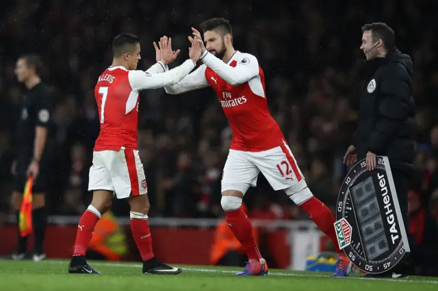 Alexis Sanchez of Arsenal comes off for Olivier Giroud