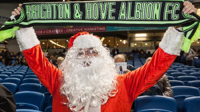 Santa Fan at the Amex Stadium