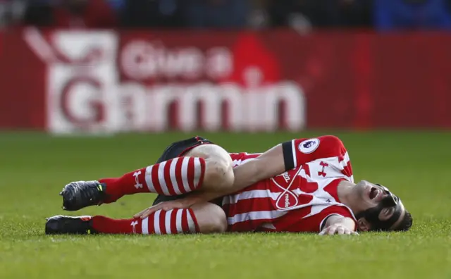 Dusan Tadic goes down injured