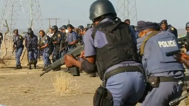 Police prepare to open fire at Marikana mine in 2012