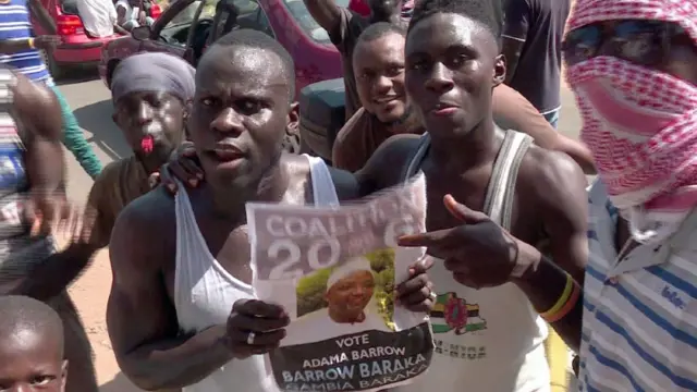 Supporters of opposition candidate Adama Barrow cheering on the streets of Banjul, after the latter pulled off a stunning victory in the Gambia, comfortably winning a presidential election and putting an end to the 22-year rule of Yahya Jammeh, official results showed on December 2, 2016