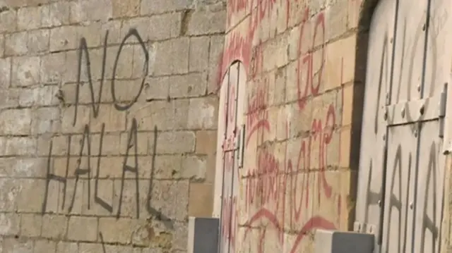 Offensive graffiti on a wall