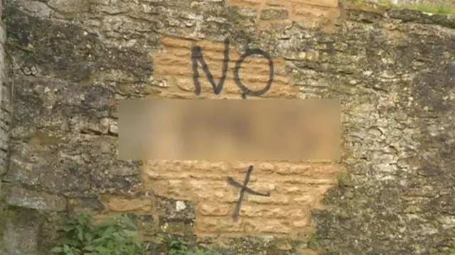Offensive graffiti on a wall