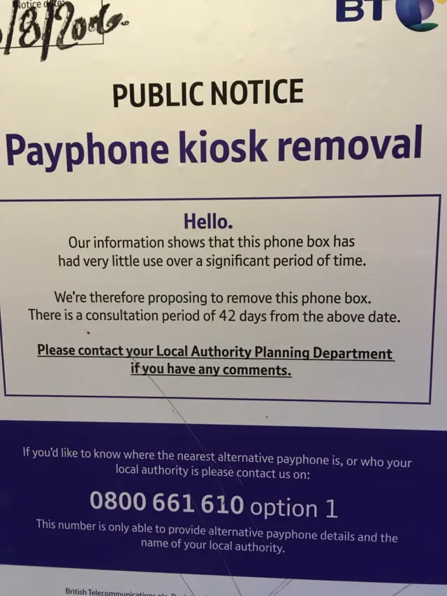 Sign inside phone box