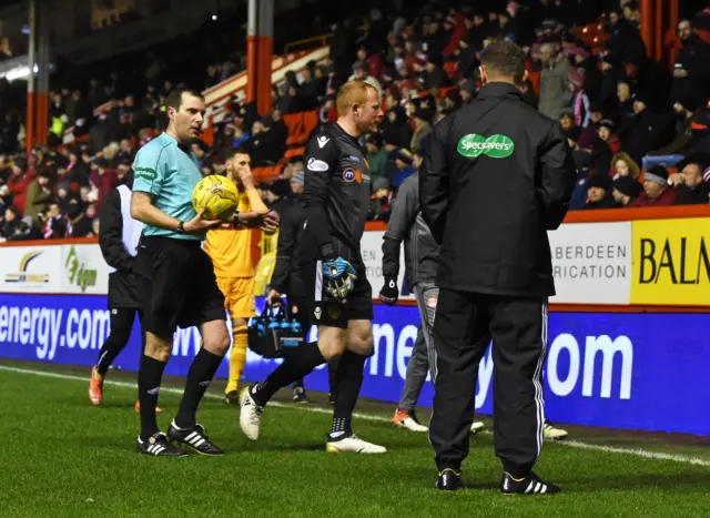 Referee Alan Muir takes the players off