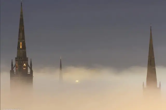 Foggy Coventry spires