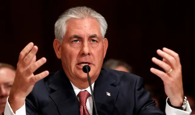 Exxon Mobil CEO and Chairman Rex Tillerson speaks as he and other top oil and gas industry executives testify during a Senate Finance Committee hearing on "Oil and Gas Tax Incentives and Rising Energy Prices" on Capitol Hill in Washington May 12, 2011