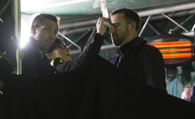 Kris Boyd (right) gets made up for TV