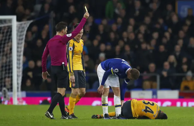 James McCarthy is shown a yellow card