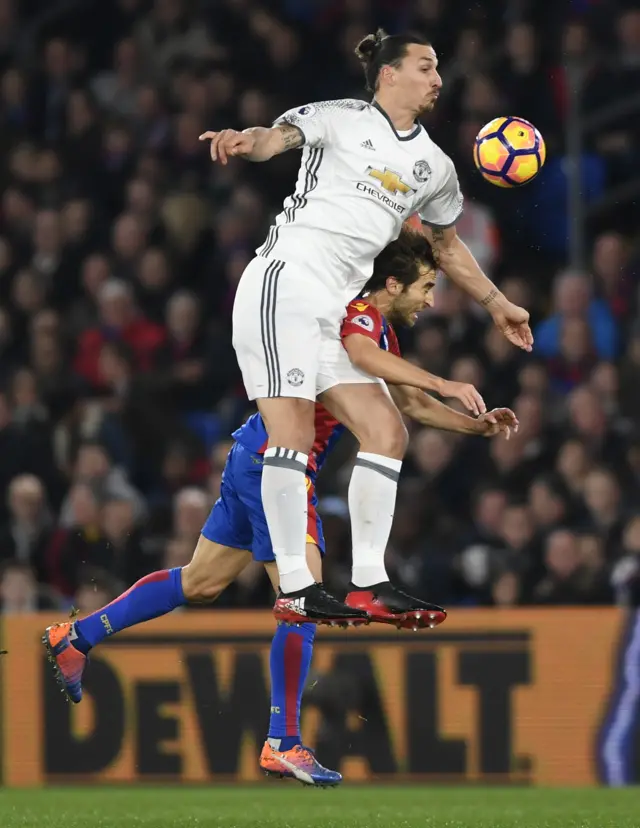 Zlatan Ibrahimovic in action with Crystal Palace"s Mathieu Flamini