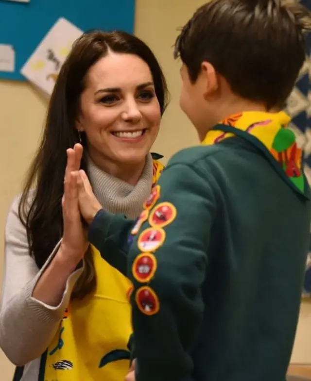 The Duchess of Cambridge exchanging a 'high five' with Dylan