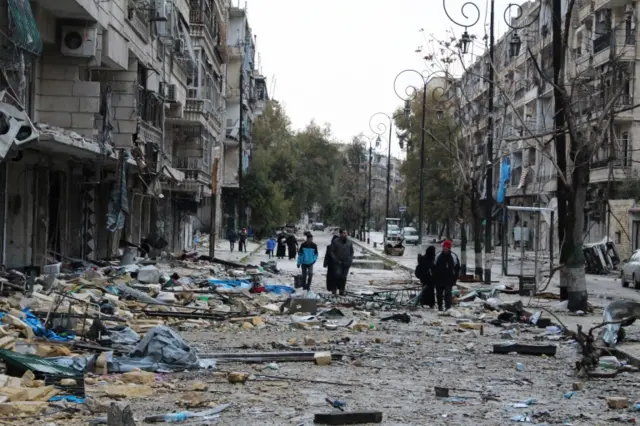 The inhabitants of the eastern neighborhoods of the northern city of Aleppo are seen inspecting their belongings and houses, Syria, on 14 December