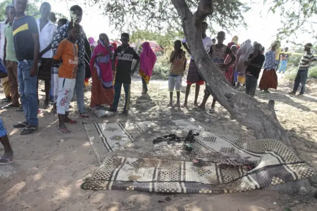 People gather at the scene