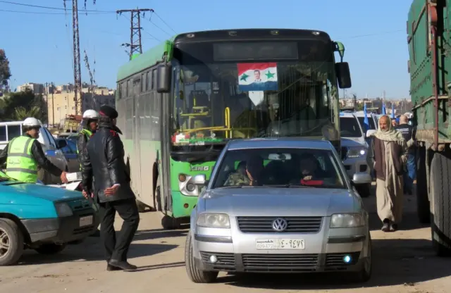 A bus is seen in Aleppo during an evacuation operation (15 December 2016)